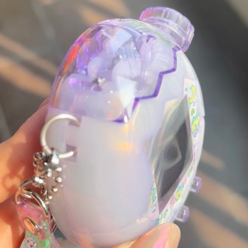 Tamagotchi Paradise Shell والأ - مراجعة Bandai Model Tamagotchi وسعره